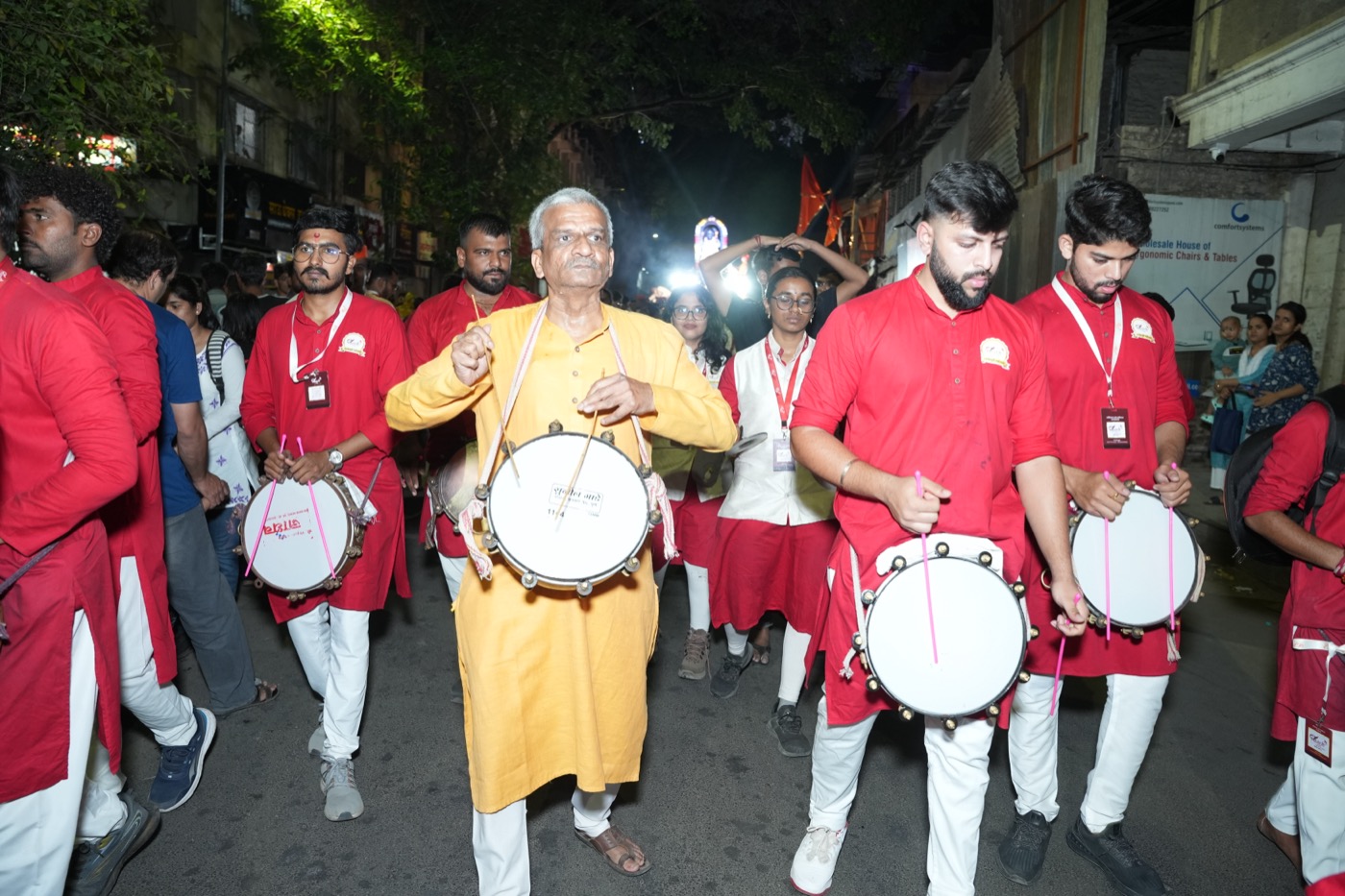 Elder with Dhol Tasha group